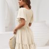 Women's Flowy Casual Mini Dresses 2025 Summer Graduation Smocked V Neck Vacation Dress Dress with Pockets